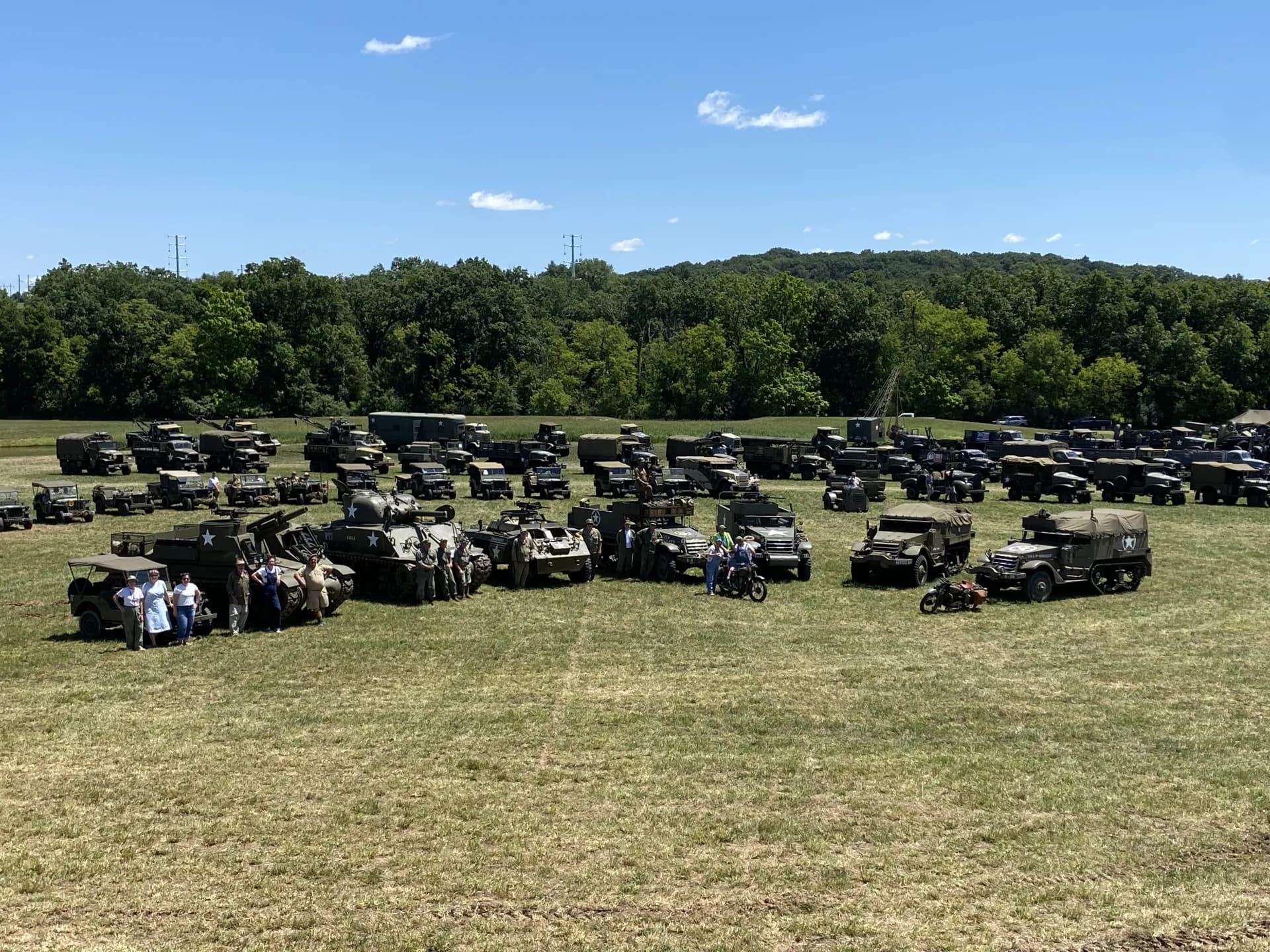 Military vehicles lined up at a museum event