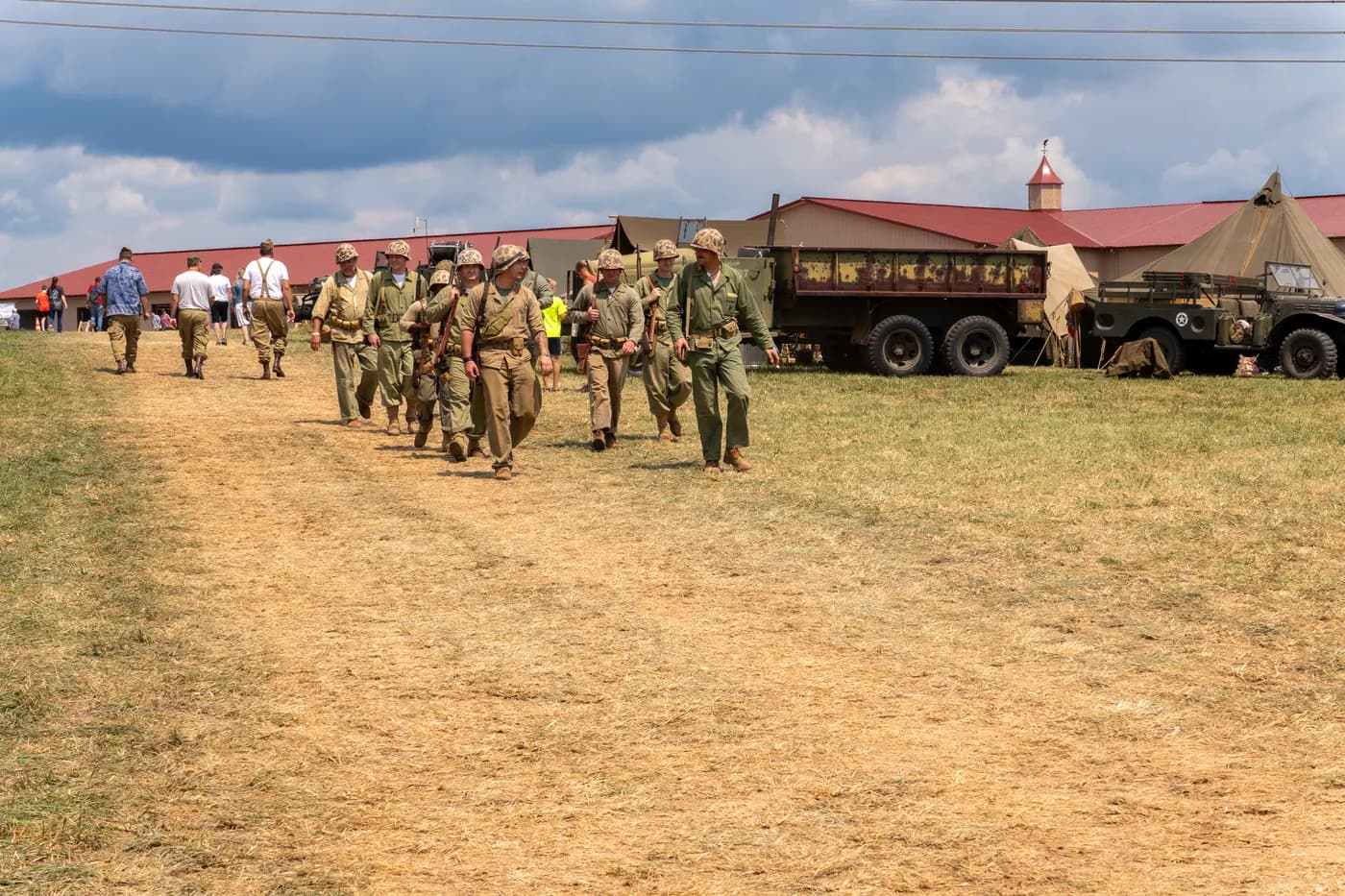 Living historians march past the museum